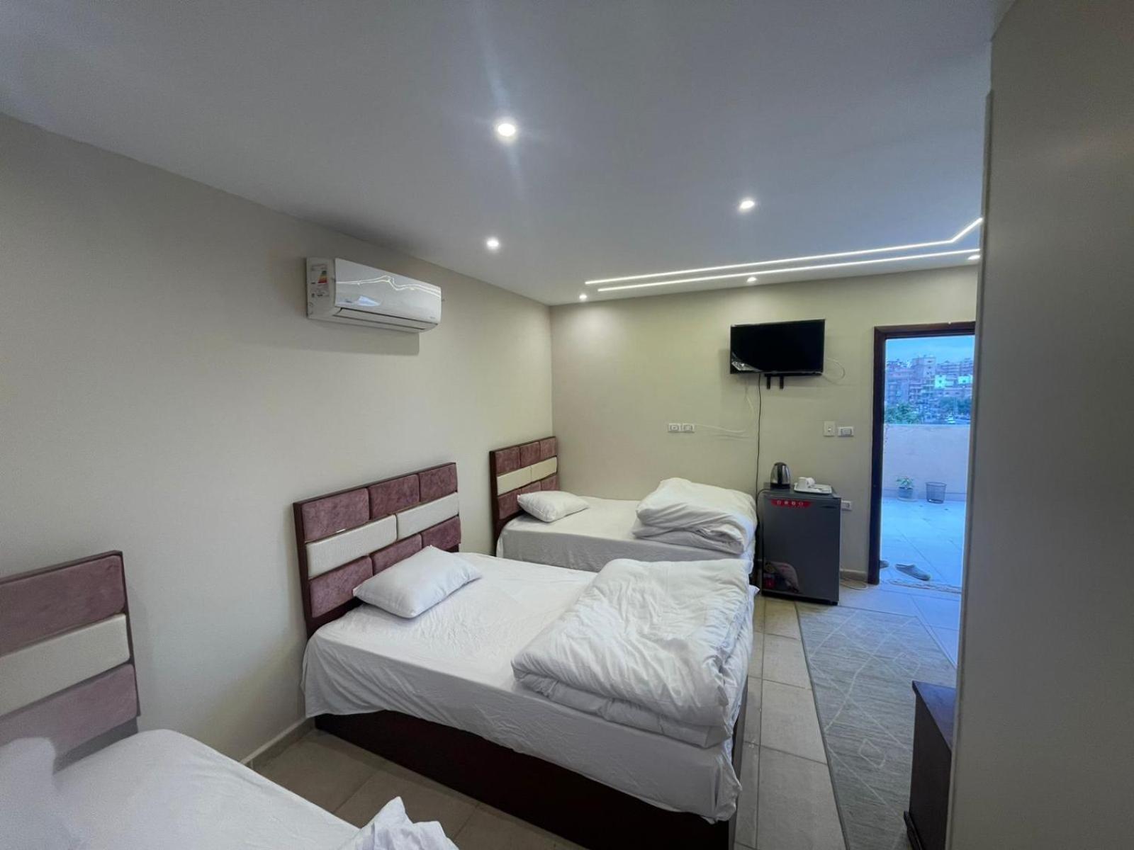 Sami Holiday Inn - Pyramids View Rooftop Al Kawm al Akhdar Dış mekan fotoğraf